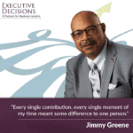 A well-dressed man wearing glasses and a suit, seated with a confident posture. The image includes text: "EXECUTIVE DECISIONS: A Podcast for Business Leaders," and a quote, "Every single contribution, every single moment of my intentional giving meant some difference to one person." - Jimmy Greene.