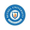 A circular logo with a blue border and white text that reads "BETHEL UNIVERSITY" at the top and "WITH CHRIST AT THE HELM" at the bottom. The center features a shield with a flame and a cross symbol inside. The year "1947" is at the bottom of the logo.