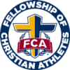 Logo of the Fellowship of Christian Athletes. It features a yellow and blue cross in the center with the letters "FCA" in a red banner across it. The cross is surrounded by a blue circle with the organization's name written in white: "Fellowship of Christian Athletes".