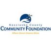 Logo of the Kosciusko County Community Foundation featuring a blue crescent with three yellow stars and a shooting star above it. The text reads "Kosciusko County Community Foundation" and below in yellow, "Where Donor Dreams Shine.