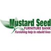 Logo for Mustard Seed Furniture Bank. Features the text "Mustard Seed" in green, "FURNITURE BANK" in pink, and "Furnishing help to rebuild lives" in pink underneath. There is a green leaf graphic extending from the letter "M" in "Mustard.